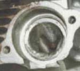 modifications to the henning honda cb500, A close up of a partially raised exhaust port Click here to see the entire head