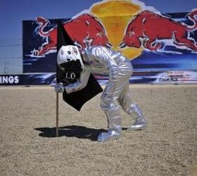 motogp 2010 laguna seca results, Jorge Lorenzo celebrated his win by dressing up as an astronaut planting his flag
