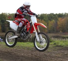 2010 honda crf250r review motorcycle com, See those trees across the way The agile and friendly CRF practically begged us to get over there so it could show off its do it all abilities