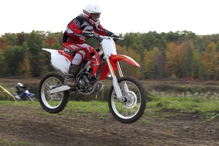 2010 honda crf250r review motorcycle com, See those trees across the way The agile and friendly CRF practically begged us to get over there so it could show off its do it all abilities