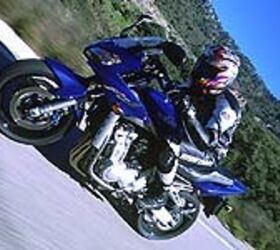 2001 yamaha fazer 1000 motorcycle com, Is this Minime on Yamaha s special road simulating treadmill or is he blasting down a Spanish backroad Only he knows for sure
