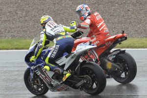 three in a row for stoner, Casey Stoner and Valentino Rossi congratulate each other after finishing one two at Sachsenring