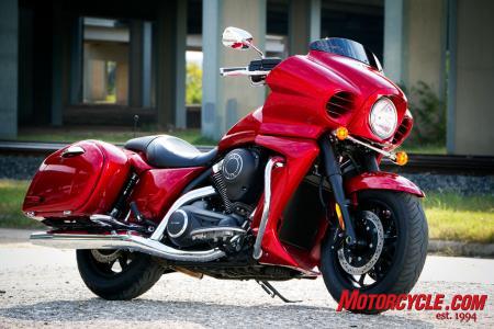 2011 kawasaki vulcan 1700 vaquero review motorcycle com, The Vaquero s styling is undeniably influenced by Harley s Road Glide Custom However Kawi adds various touches to the Vaquero s looks like the Candy Fire Red bike s color matched headlight trim and color matched inner fairing in an effort to set the Vaquero apart from its competition
