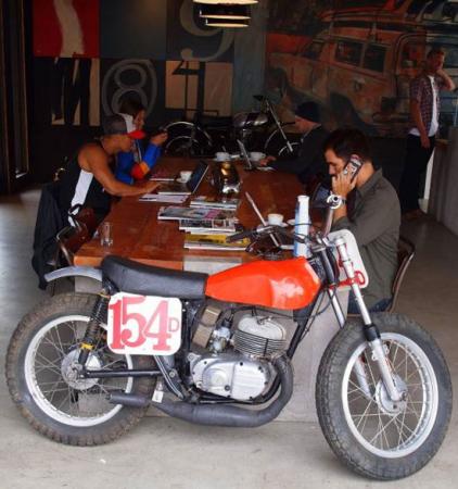inside deus ex machina, We eat sleep compute motorcycles then compute some more Vintage Bultaco serves as interior d cor for the WiFi equipped shop