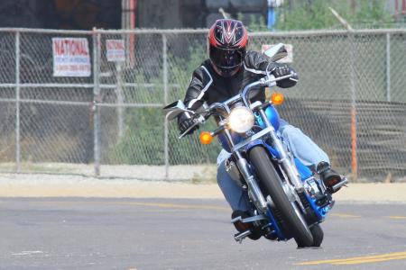 2011 honda sabre review motorcycle com, Maximum lean angle almost achieved Lean her over just a little more and hard parts will start to make contact with the ground Clearly the Sabre wasn t meant to perform stunts like this