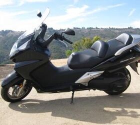 2011 honda silver wing abs review motorcycle com, The 2011 Silver Wing continues with its same swoopy aerodynamic design It s definitely attractive but an update might be in order