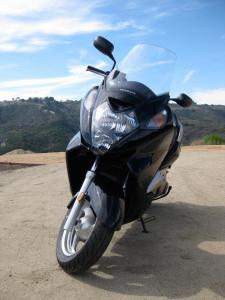 2011 honda silver wing abs review motorcycle com, A generous fixed windscreen provides ample protection