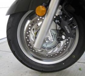 2011 honda silver wing abs review motorcycle com, Both fore and aft you ll find single 276 mm discs with a three piston calipers that offer not only ABS but a dual braking system
