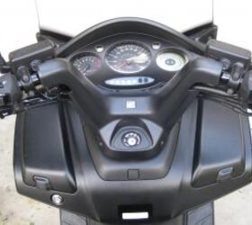 2011 honda silver wing abs review motorcycle com, The Silver Wing s controls and dials offer no frills but are easily read and used The bars offer a comfortable riding position that still offers good control