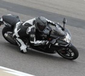 2011 suzuki gsx r750 review motorcycle com, Like any Gixxer the 750 is at home on a racetrack and its generous midrange torque is an asset for everyday use on the street