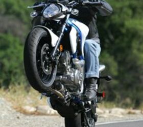 2009 suzuki gladius review motorcycle com, A little finessing of the clutch and antics like this are cake on the torque happy Gladius