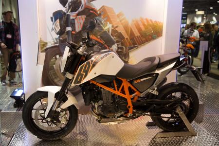 2012 progressive international motorcycle show report video, Targeted at a broader audience the new KTM 690 Duke will be available in two colors for 2013 black and white Pricing is TBD