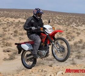 2008 honda crf230l review motorcycle com, As you d expect from an air cooled two valve Thumper arm yanking power isn t the CRF s bag of tricks