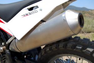 2012 husqvarna te250 review motorcycle com, The Leo Vince exhaust is a key feature of the TE250 its wonderfully aggressive note makes us wonder how this thing slipped by EPA sound emissions standards