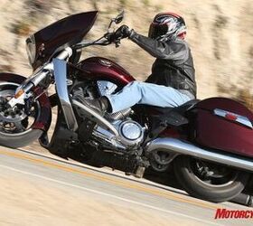 2010 victory cross country review motorcycle com, The CC s saddlebags are some of the roomiest according to Victory However they re not quite as roomy as their shape implies Note the large chrome portion of the crash guard just ahead of the floorboard