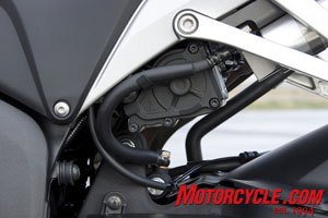2009 honda cbr600rr c abs review motorcycle com, Here s we can see the rear power unit one of the few C ABS components visible The five components that make up the new C ABS are located on the bike in places that complements mass centralization