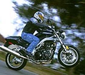 first ride 2002 triumph speed triple motorcycle com, On the Triumph you re kind of a tough guy see It s so James Bond It so well it s just plain cool