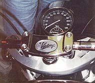 1998 polaris victory v92c motorcycle com, Note the Victory s distinctive handlebar clamp and headlamp mounted speedo