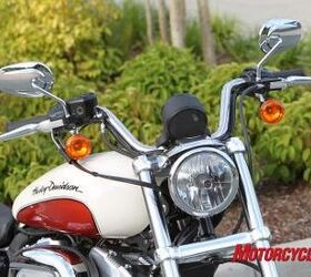 2011 harley davidson sportster superlow motorcycle com, The handlebar has slightly more rise and the triple trees are wider giving the SuperLow a more masculine appearance