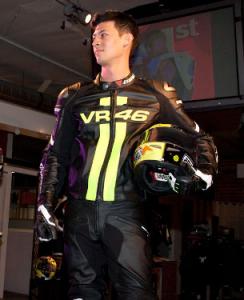 dainese d air racing leathers make u s debut, The VR46 Jacket ties the connection to Dainese s most famous rider Valentino Rossi as do the VR46 Sport Racing gloves AGV s new Grid helmet in Rossi s sun moon design from back in 1996 is a nice complement