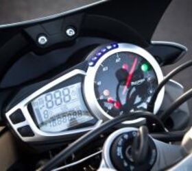 2013 triumph street triple r review motorcycle com, LCD multi functional instrument cluster includes a digital speedometer fuel gauge trip computer analog tachometer lap timer gear position indicator programmable shift lights clock ABS and is TPMS ready