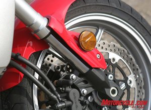 2008 kawasaki versys road test motorcycle com, Despite 300mm petal type rotors borrowed from the supersport ZX machines the two piston sliding pin calipers don t offer a lot of feel A single four piston caliper of higher quality may have been a better choice