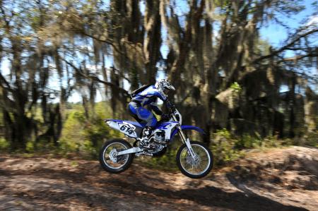 2012 yamaha wr450f review motorcycle com, Trail situation drop offs and high speed jumps are handled with confidence by the WR s new frame and suspension