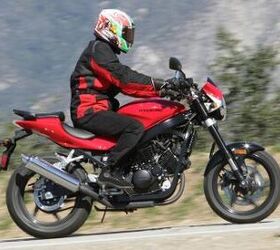 2011 hyosung gt250 review motorcycle com, In many ways the GT250 feels like a bigger machine Its 56 5 inch wheelbase is the longest in its class and the 32 7 inch seat height isn t for the faint of heart