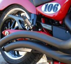 2010 victory vegas le review motorcycle com, The Stage 1 Swept System exhaust in matte black from Victory s line of performance accessories is one of the best ways to dress up an LE especially a Fireball Red