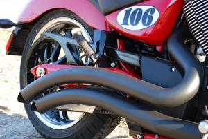2010 victory vegas le review motorcycle com, The Stage 1 Swept System exhaust in matte black from Victory s line of performance accessories is one of the best ways to dress up an LE especially a Fireball Red