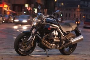 2006 moto guzzi griso motorcycle com, Move on to the left side and oh my god That muffler Those snaking exhaust tubes There s a big show here