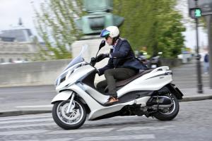 2012 piaggio x10 350 review motorcycle com, The rudimentary traction control system proved to be a bit obtrusive on the wet streets and riding over painted lines