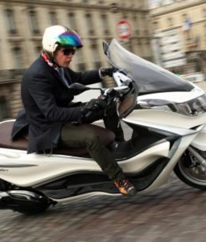 2012 piaggio x10 350 review motorcycle com, The cobblestone streets of Paris proved to be a challenge for the X10 s rear suspension