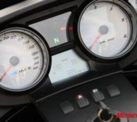 2010 victory vision 8 ball review motorcycle com, Clean and classic styling in the dash includes an analog speedo and tachometer plus the more up to date digital details in the LCD portion
