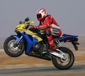 2006 honda cbr 1000rr motorcycle com, There isn t a photo of his near loop and this is the closest Sean would come to a big wheelie for the rest of the day There s no question this new CBR is a harder hitting motorcycle