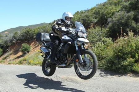 2011 triumph tiger 800 800xc review video motorcycle com, The Triumph Tiger 800 and Tiger 800XC are capable of holding their own whether it s on pavement or dirt or in the air