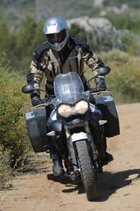 2011 triumph tiger 800 800xc review video motorcycle com, The standard Tiger 800 is a capable off roader as long as the going doesn t get too rough