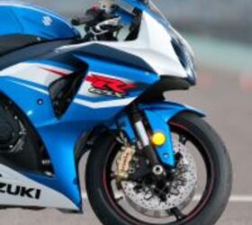 2012 suzuki gsx r1000 review video motorcycle com, Gone are the gold forks of 2011 replaced with black units More important however are the new monobloc Brembo calipers