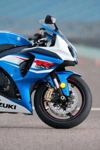 2012 suzuki gsx r1000 review video motorcycle com, Gone are the gold forks of 2011 replaced with black units More important however are the new monobloc Brembo calipers