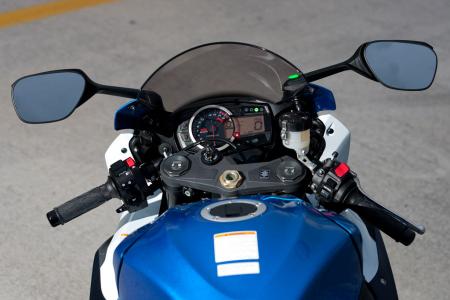 2012 suzuki gsx r1000 review video motorcycle com, The cockpit is home to many buttons and displays but none of them include settings for traction control