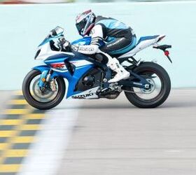 2012 suzuki gsx r1000 review video motorcycle com, It s easy to get comfortable on the latest Gixxer Thou if you ve liked the ergos of previous models With plenty of room to scoot around in the saddle and adjustable footpegs riders of many shapes and sizes are accommodated