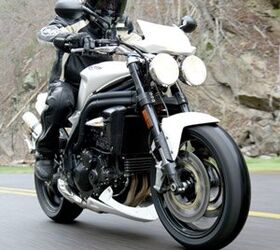 2008 triumph urban sports review motorcycle com, With its distinctive twin round headlamps the Speed Triple retains its iconic streetfighter persona