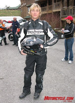 2008 triumph urban sports review motorcycle com, Duke shows off the Hawk jacket from Triumph s clothing line Shift pants Icon boots and an Akuma helmet complete the outfit