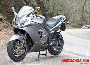 2008 triumph urban sports review motorcycle com, Revised headlights and a new Graphite color option are some of the few things changed for the 08 Sprint ST Hard luggage not shown is standard equipment