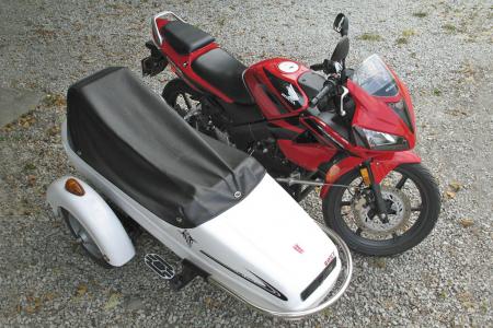 2010 honda cbr125r review motorcycle com, The CBR s 13 5 horsepower didn t put off this British Columbia rider he added a sidecar Photo by Jean Pascal Schroeder