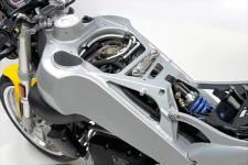 2003 buell xb9s lightning motorcycle com, The big silver gas tank has a pass through for the air intake in the left frame spar The airbox connects to this and fills the gap between the spars where the fuel tank would normally be