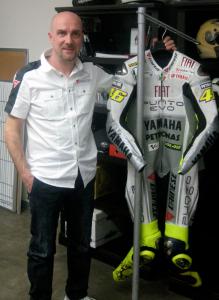 2010 dainese lineup unveiled, Silvano Celi poses next to the D Air prototype race suit