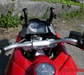 2008 moto guzzi stelvio review motorcycle com, The Stelvio s wide handlebar underlines the simple but effective gauges