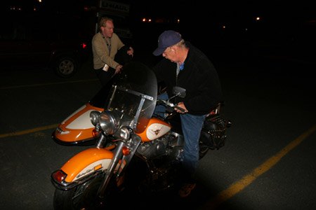 documentary filmmakers ride for als, Bob ALS patient getting on the bike at St Peter s parish in mount pearl N L