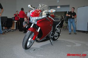 2010 honda vfr1200f revealed motorcycle com, Journalists catch a glimpse of the VFR1200F at the unveiling